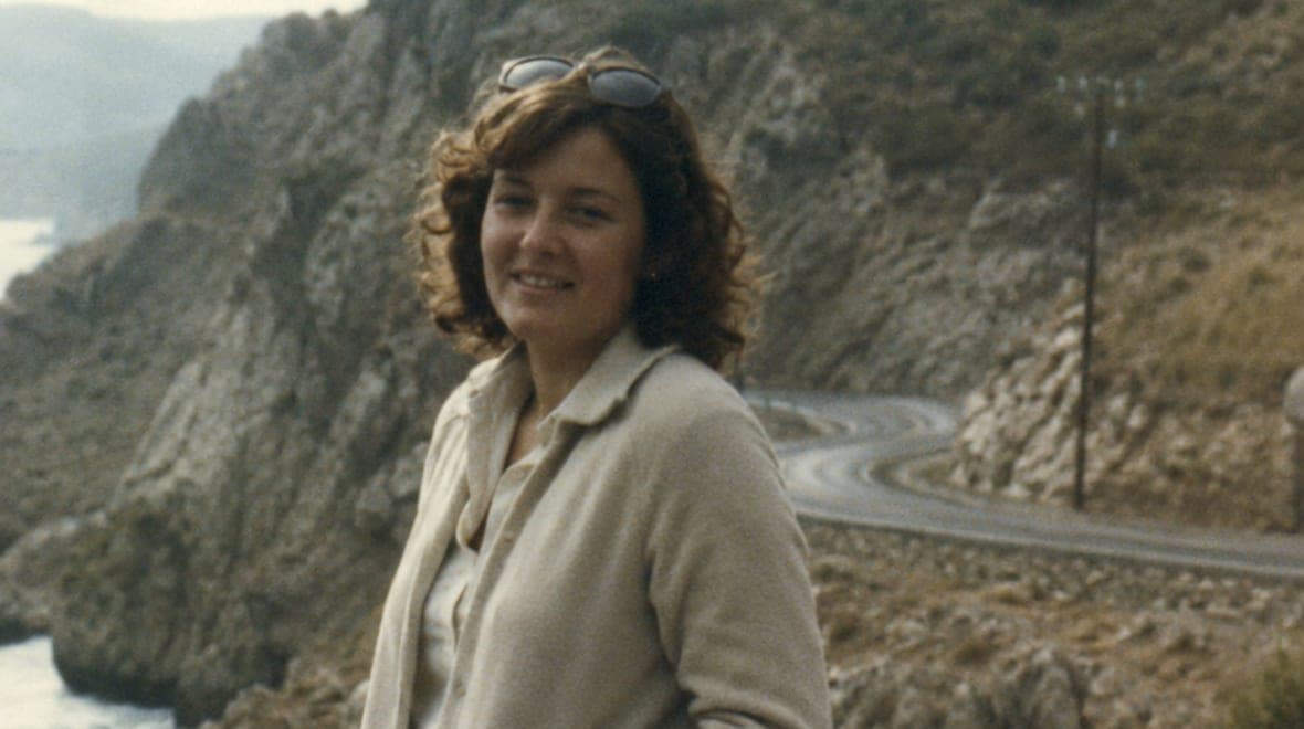 A young woman on a coast road in the nineteen seventies